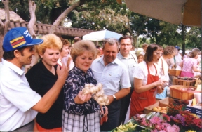 Visitors from Uman admire produce at the Davis Farmers Market.